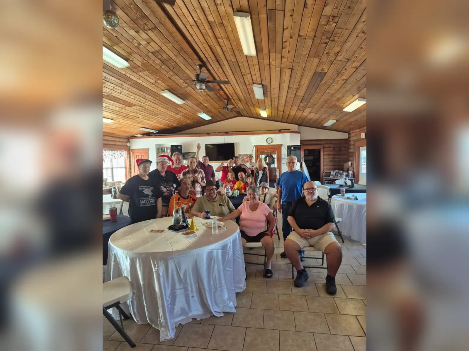 Campground guests celebrating together in the Endless Summer community room